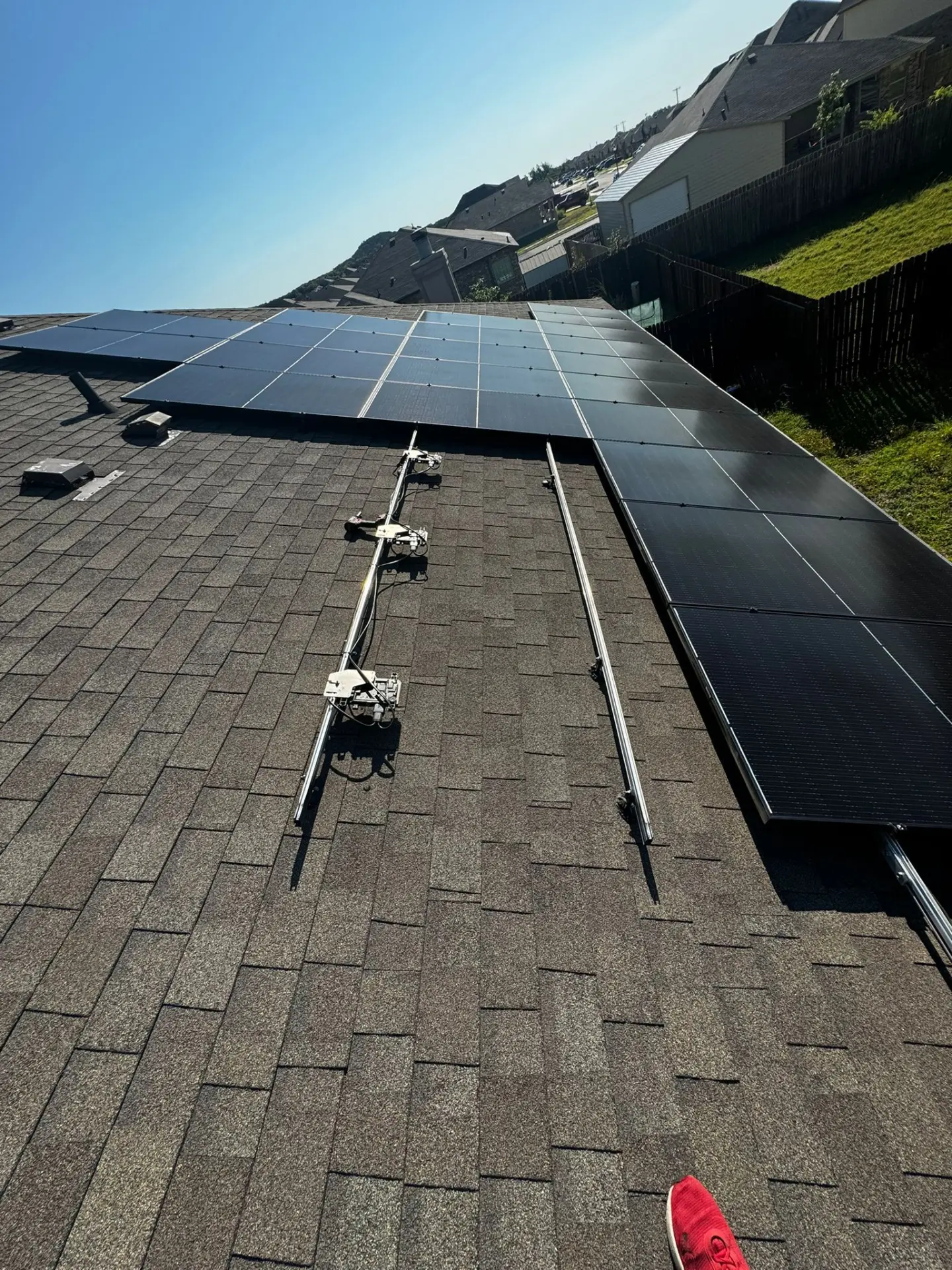 Residential rooftop solar array installed by Big Texas on a shingle roof
