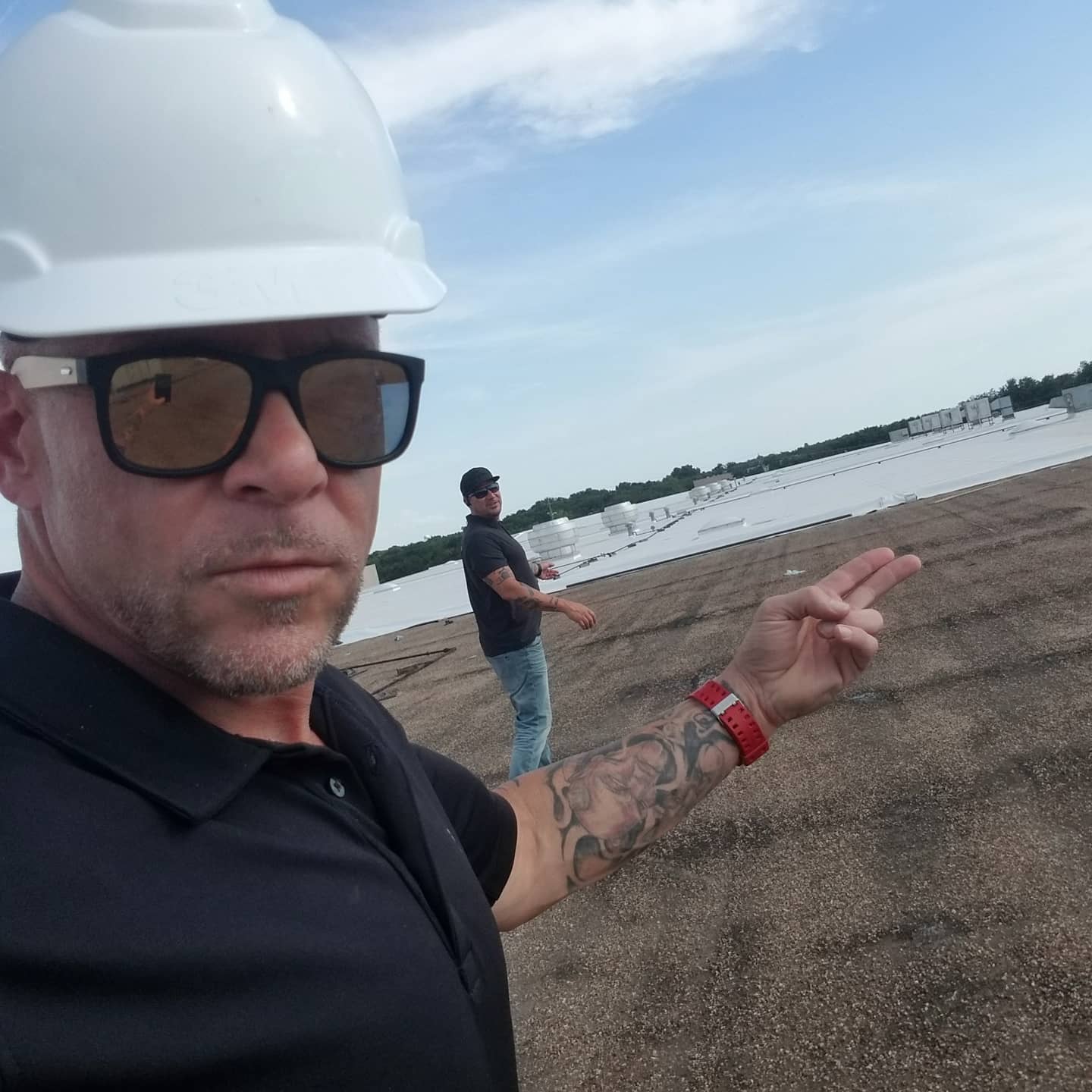 Big Texas Roofing crew on a large commercial roofing project